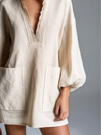 Beige V-neck Lace-trimmed Lantern Sleeve Patch Pocket Loose Mini Dress