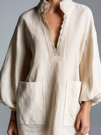 Beige V-neck Lace-trimmed Lantern Sleeve Patch Pocket Loose Mini Dress