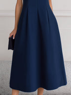 Sleeveless Deep V-Neck Inverted Pleat A-Line Midi Dress