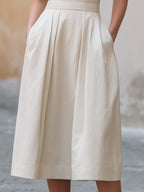 Structured V-Neck Pleated Waist A-Line Midi Dress